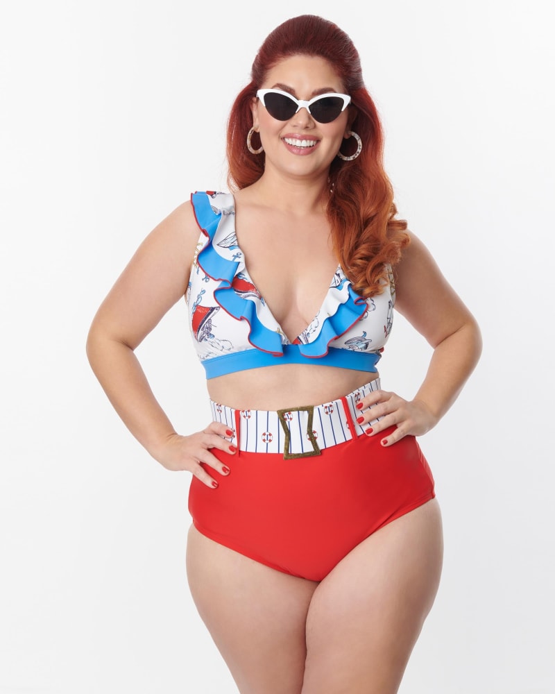 Front of a model wearing a size 1X/16 Unique Vintage Plus Size White & Blue Nautical Print Ruffle Swim Top in White & Blue Nautical Print by Unique Vintage. | dia_product_style_image_id:269663